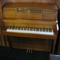 Starck store upright piano